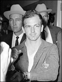 lee-harvey-oswald-in-dallas-custody CAPA Overview As 3,539 More JFK Documents Are Released On Dec. 15